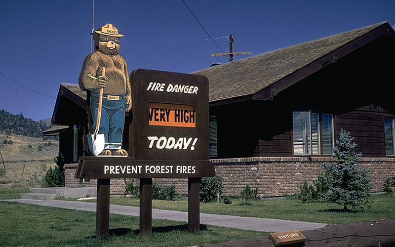 sign outside park office with fire danger level listed as "very high"