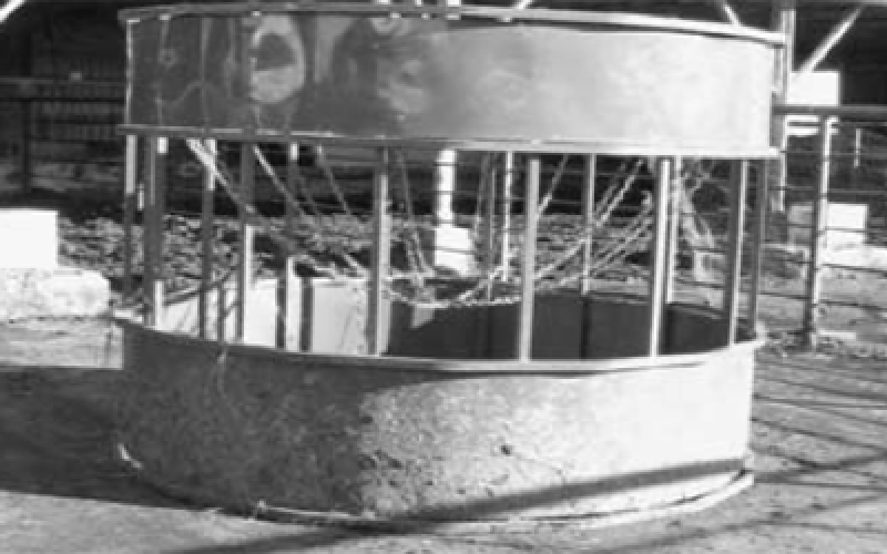 an open bal hay feeder