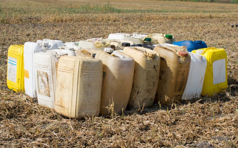 A collection of empty pesticide and herbicide containers.