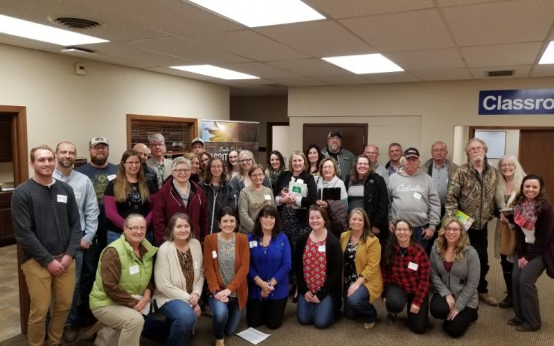 a group of people gathered after a conference