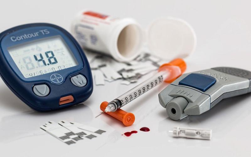 Assorted medical equipment for at-home diabetes testing and care.