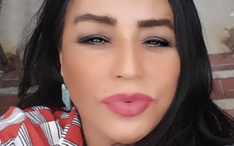 a woman in a red and white striped shirt