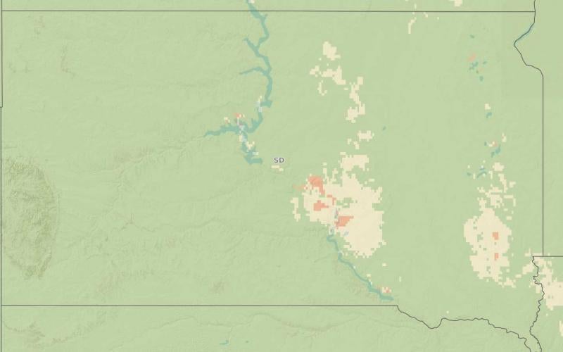 Map of South Dakota showing Fusarium head blight risk. Green indicates low risk, yellow moderate risk, and red high risk. Most of the state is green except for scattered, yellow areas within Edmunds, Faulk, Hyde, Hand, Buffalo, Jerauld, Brule, Aurora, Turner, Lincoln, McCook, Lake, Brookings, and Kingsbury counties. Some red, high risk areas are in Buffalo, Brule, Hyde, and Minnehaha counties.