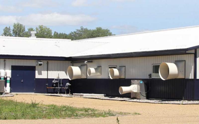 Fans outside th SDSU Swine Education and Research Facility.