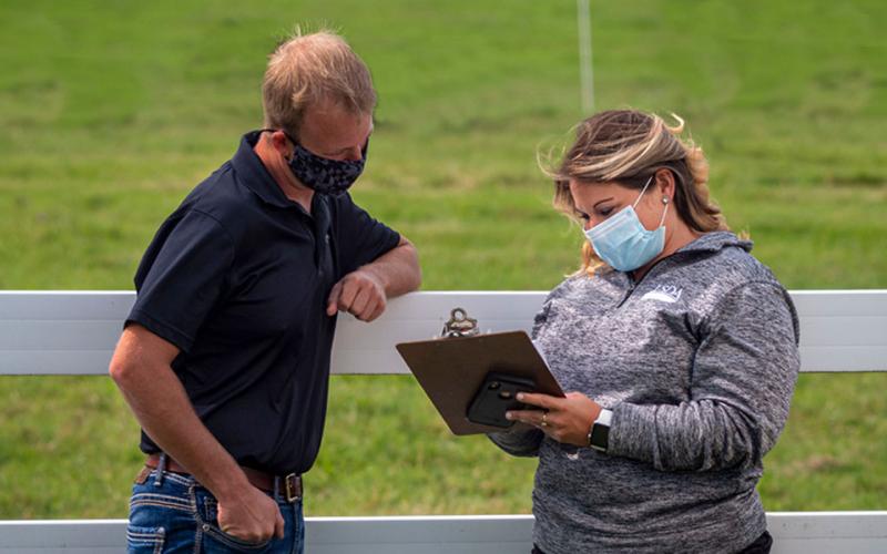 Producer and USDA agent reviewing CFAP 1.0 application.