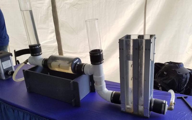 tubes with water sitting on a table