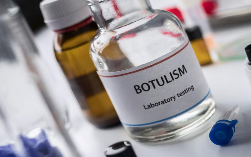 Botulism testing supplies arranged in a lab.