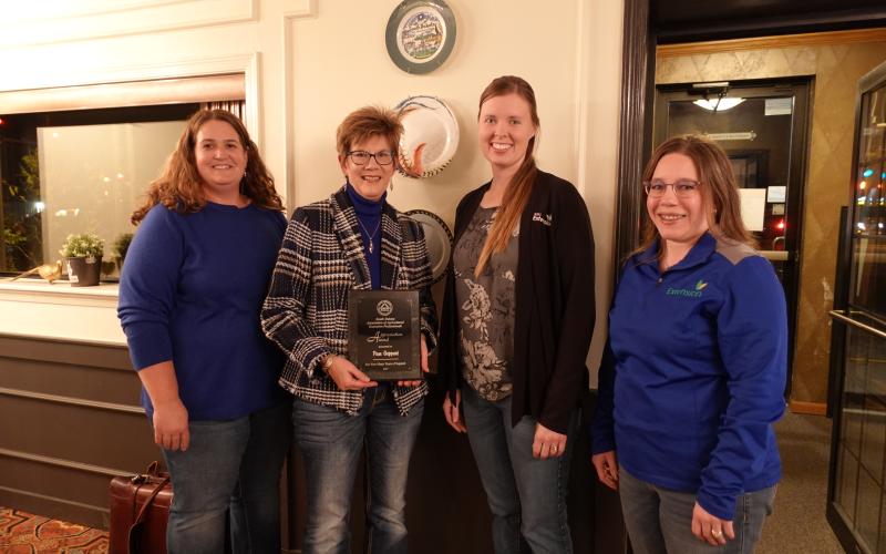 Adele Harty, Sara Bauder and Connie Strunk, pose with Pam Geppert, winner of the Friend of SDAAEP award.
