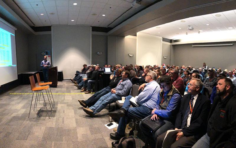 Attendees viewing a presentation at the I-29 Moo University Dairy Beef Short Course.