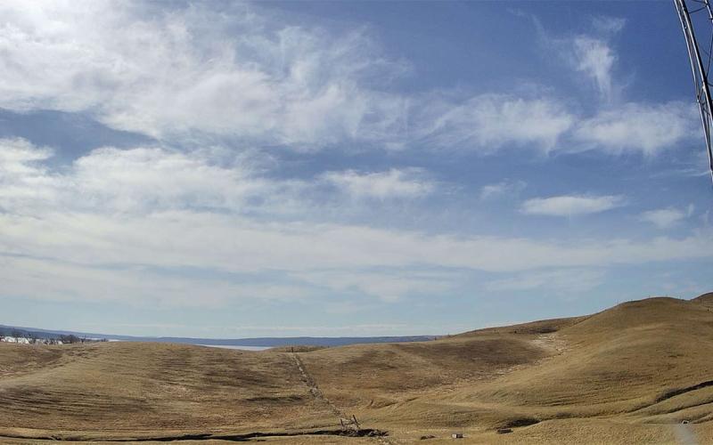 South-facing view of a dry, rolling field at the Oacoma station.