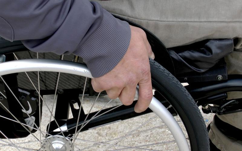 Man in wheelchair.