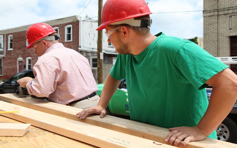 Volunteers working on a community construction project.