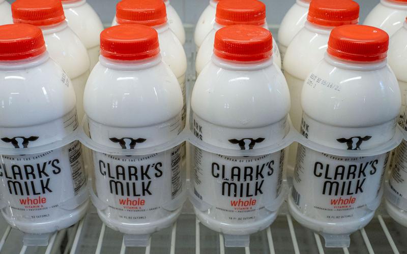 Bottles of on-farm pasteurized and packaged whole milk.