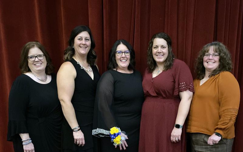 4-H professionals recognized at a national conference smile for the camera
