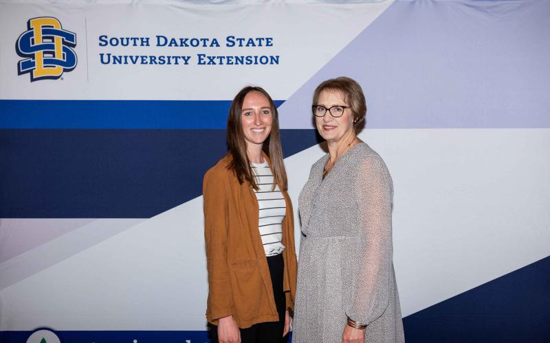 Anna Tvedt smiles at the camera with Karla Trautman
