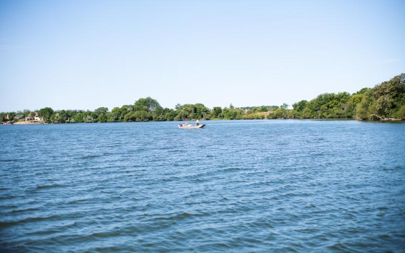 A fishing boat in the middle of Oak Lake