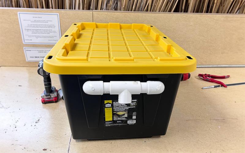 Completed black soldier fly rearing bin sitting on a worktable.