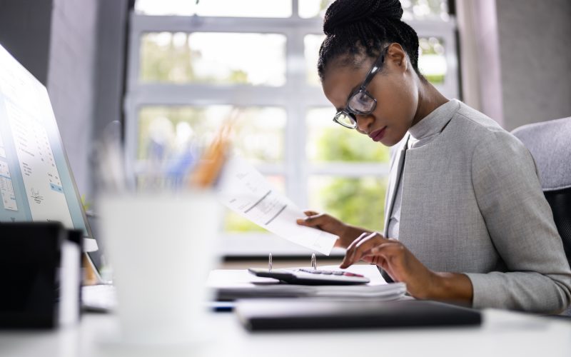 Woman using a calculator