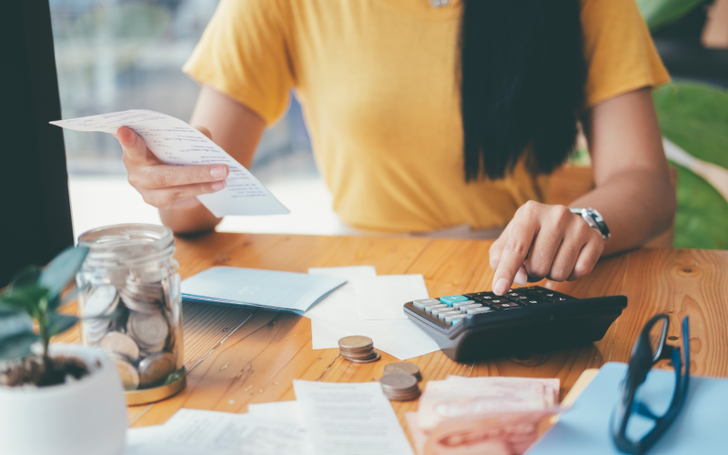 Woman using a calculator