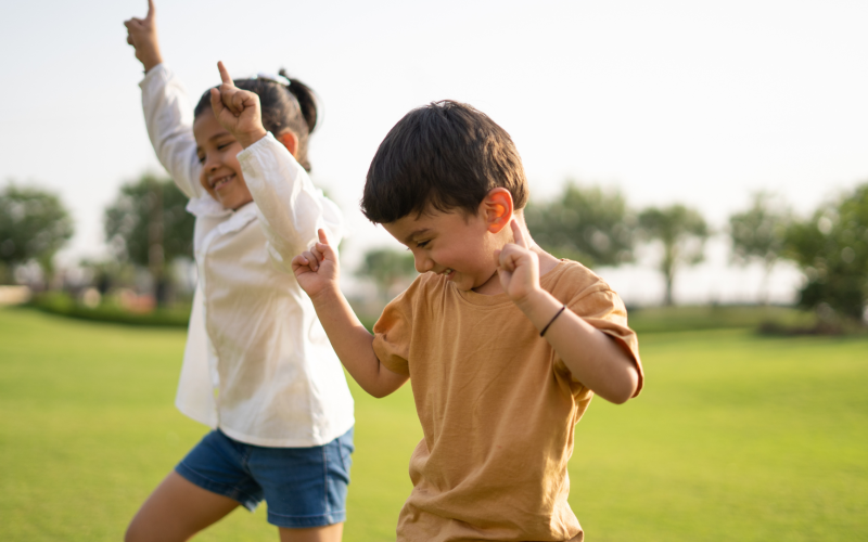 Two children dancing