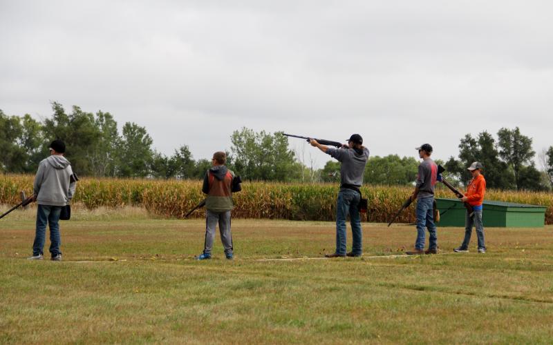 Group of youth competing in trap